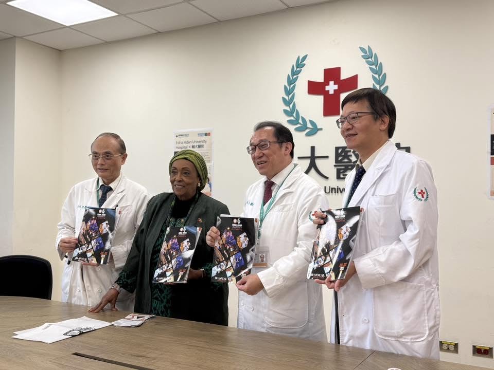 Edna Adan Ismail with visiting hospital administrators at an academic partnership signing