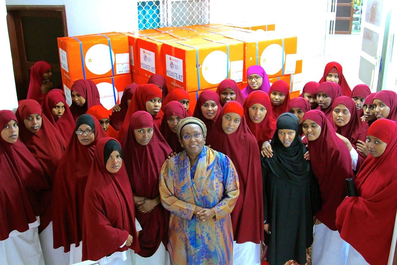 Edna Adan Ismail with a group of midwife trainees and donated Direct Relief midwife kits